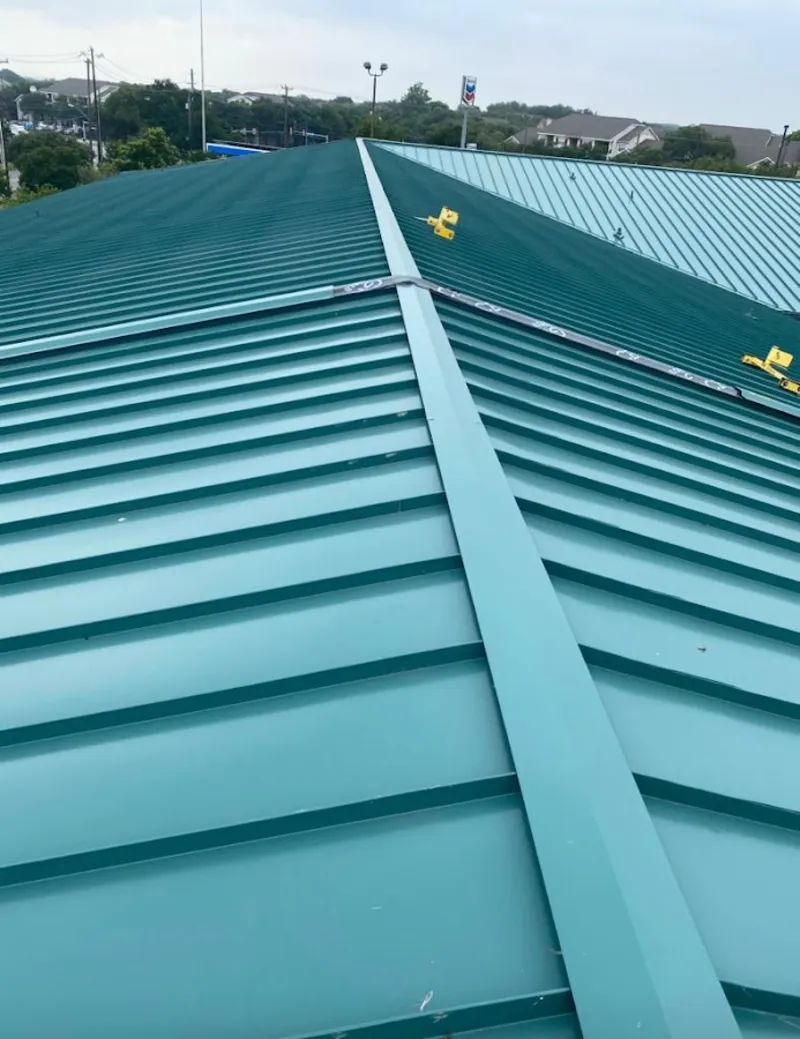 Green commercial metal roof ridge and valley for Metal Roof Repair in Mount Holly